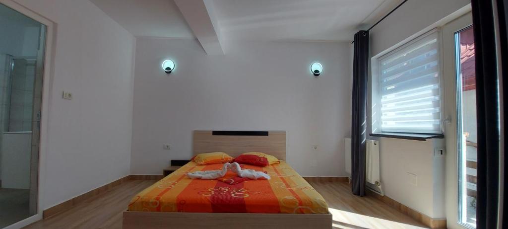 Postel nebo postele na pokoji v ubytování Casa Francisc