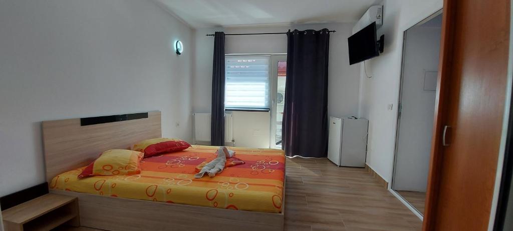 Postel nebo postele na pokoji v ubytování Casa Francisc