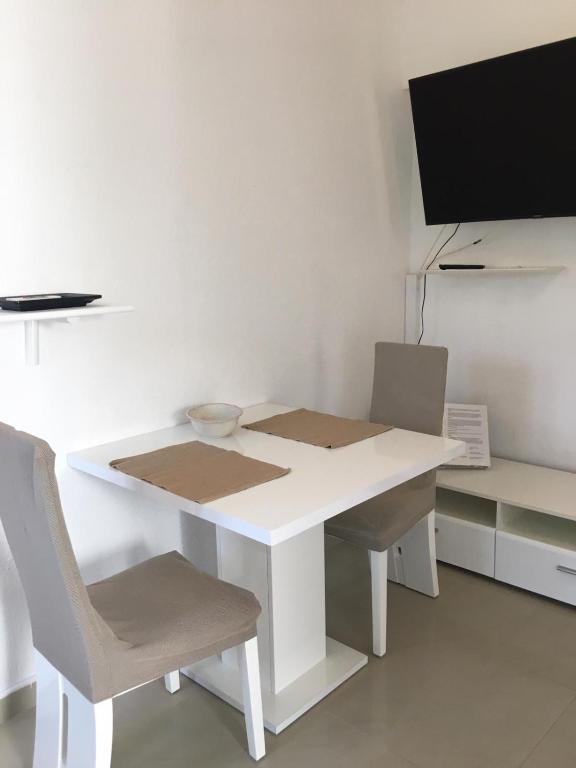 TV a/nebo společenská místnost v ubytování Beach House Paradiso