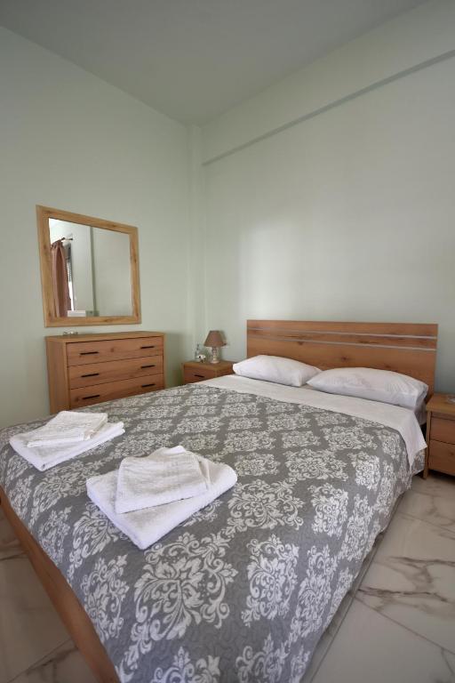 Postel nebo postele na pokoji v ubytování APOSTOLIAS APARTMENTS