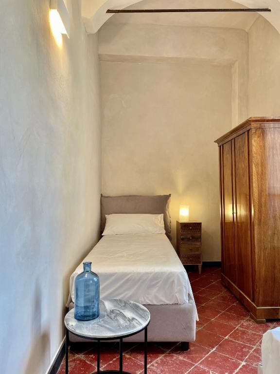 Posteľ alebo postele v izbe v ubytovaní Corallini Luxury Apartments - Bokè Apartment