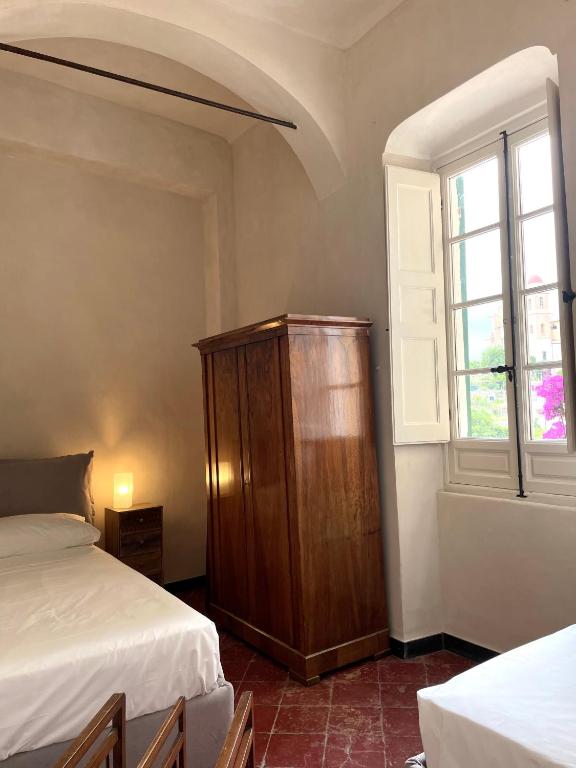 Posteľ alebo postele v izbe v ubytovaní Corallini Luxury Apartments - Bokè Apartment