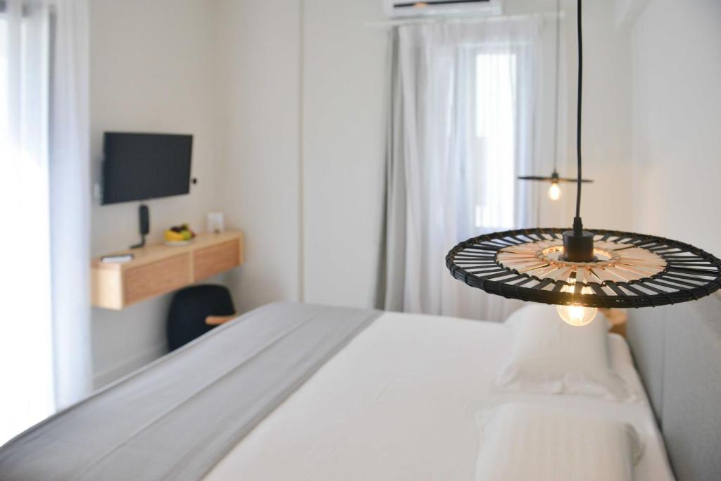 Ένα ή περισσότερα κρεβάτια σε δωμάτιο στο Princess Mare Hotel - Adults Only