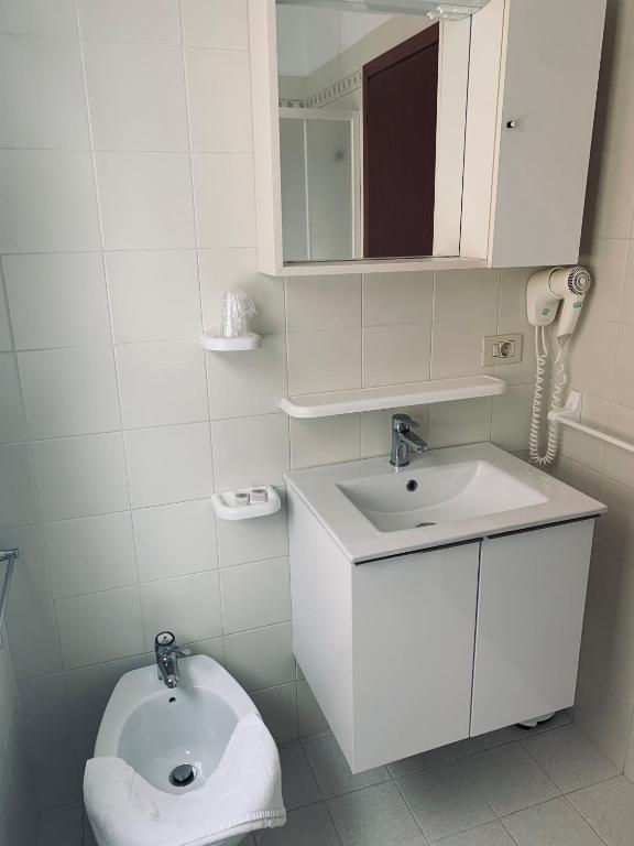 Koupelna v ubytování Hotel Al Capitano