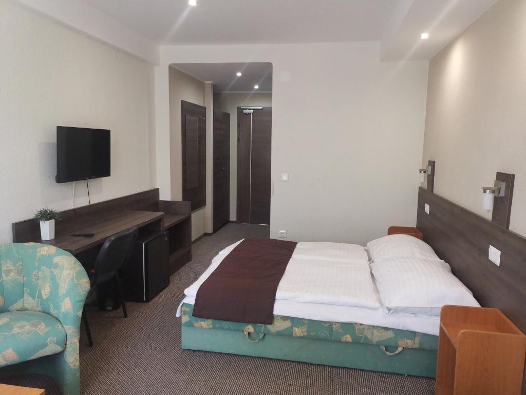 TV a/nebo společenská místnost v ubytování Hotel Tagore