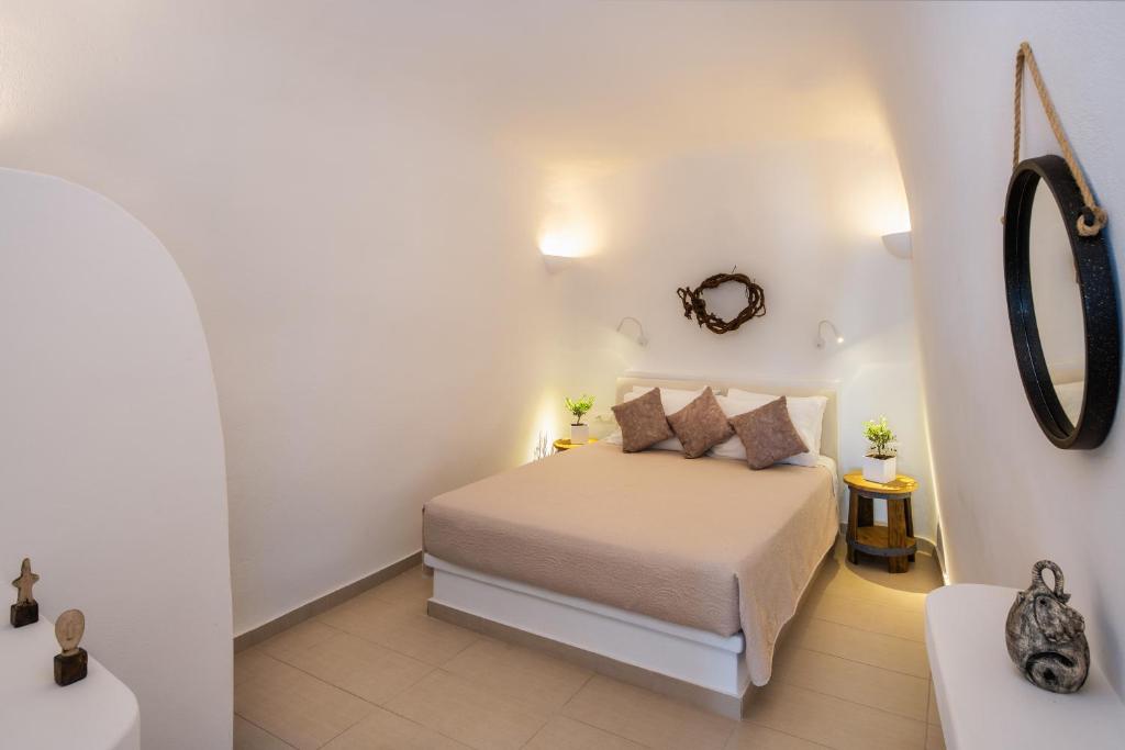Postel nebo postele na pokoji v ubytování Aegean Mist Luxury Suites