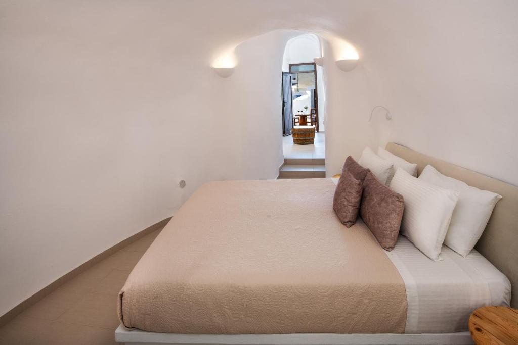 Postel nebo postele na pokoji v ubytování Aegean Mist Luxury Suites