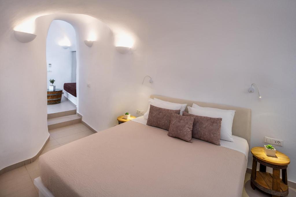 Postel nebo postele na pokoji v ubytování Aegean Mist Luxury Suites