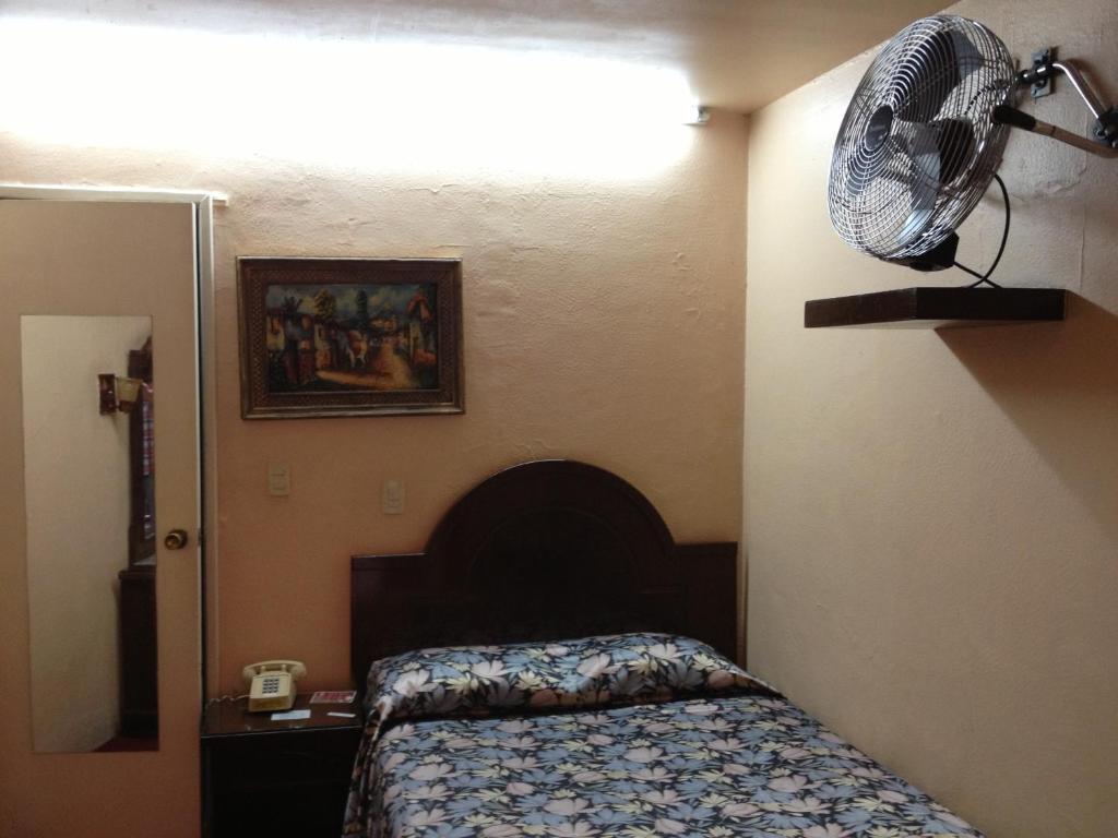 Postel nebo postele na pokoji v ubytování Hotel Gomez de Celaya
