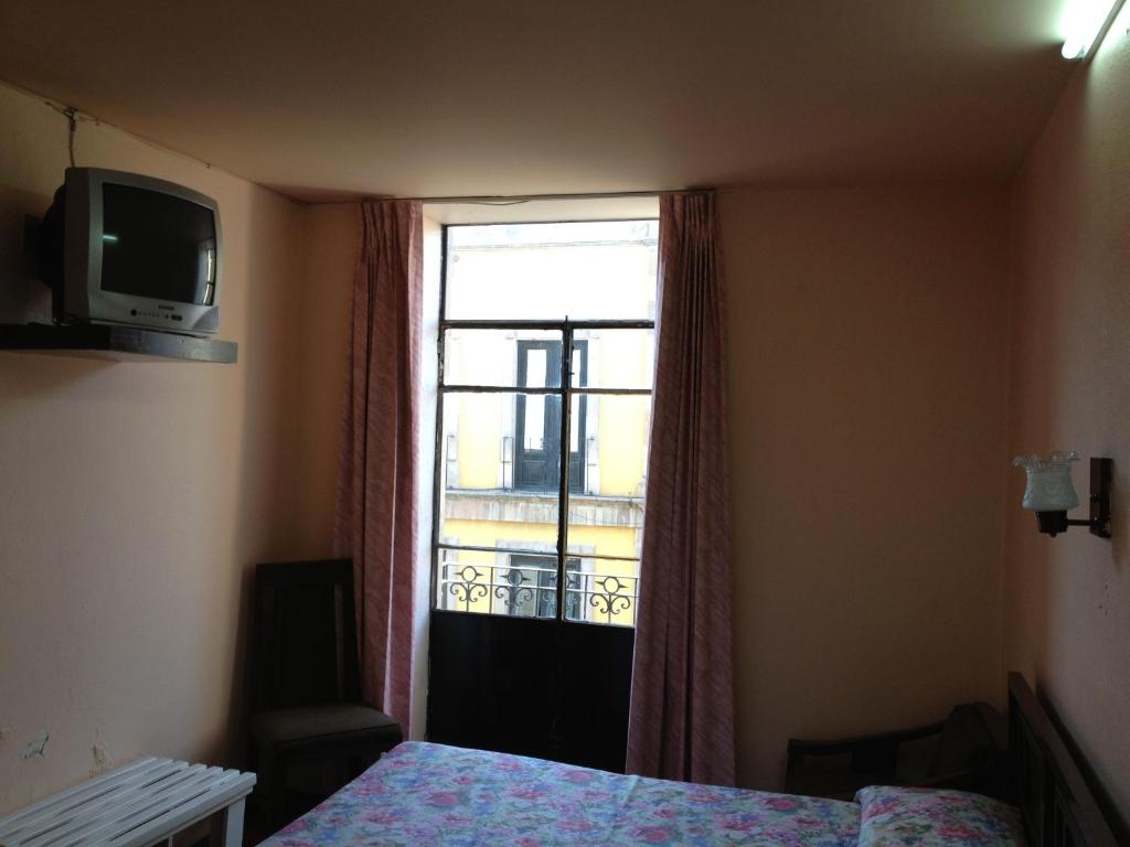TV a/nebo společenská místnost v ubytování Hotel Gomez de Celaya