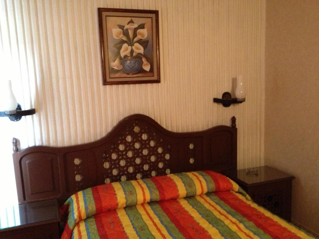 Postel nebo postele na pokoji v ubytování Hotel Gomez de Celaya