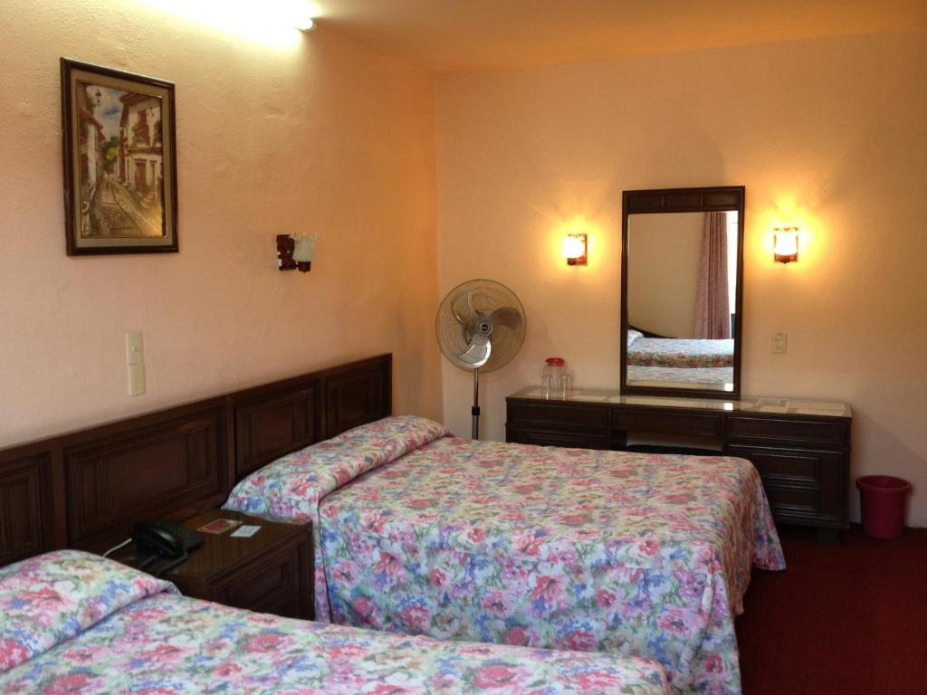 Postel nebo postele na pokoji v ubytování Hotel Gomez de Celaya