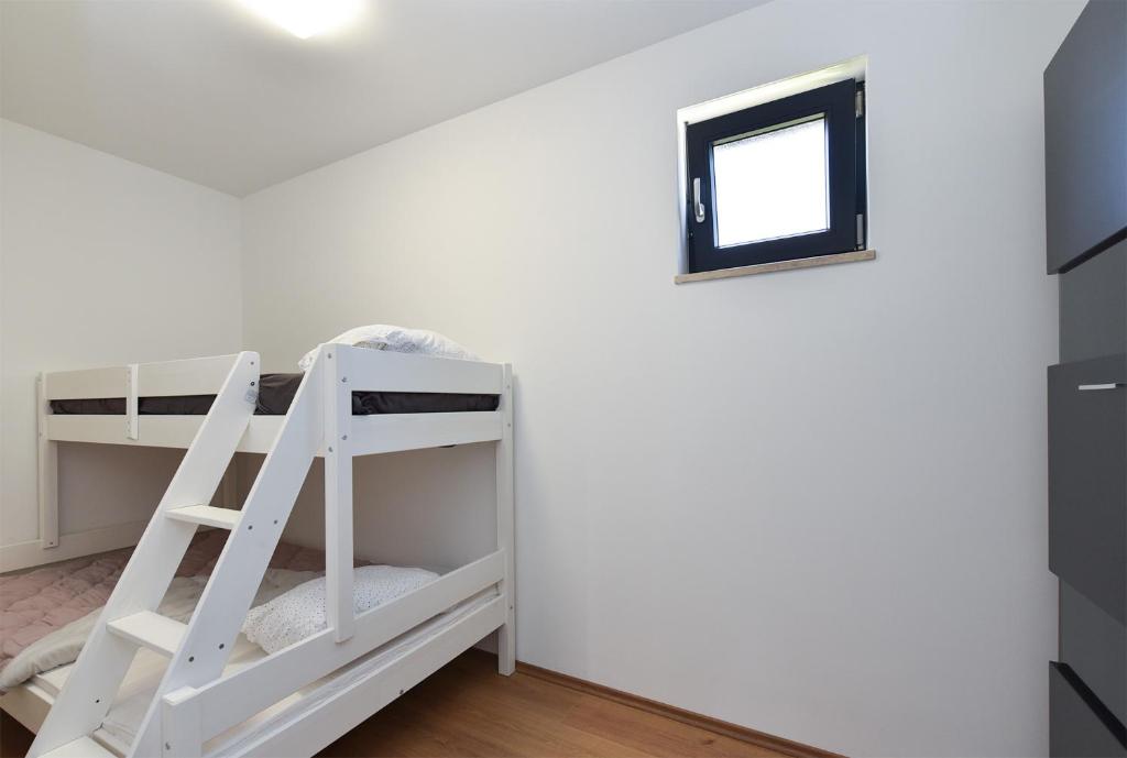 Postel nebo postele na pokoji v ubytování Villa Tamara 2044