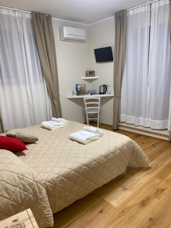 Postel nebo postele na pokoji v ubytování Podere Belsogno-Camera Lavanda