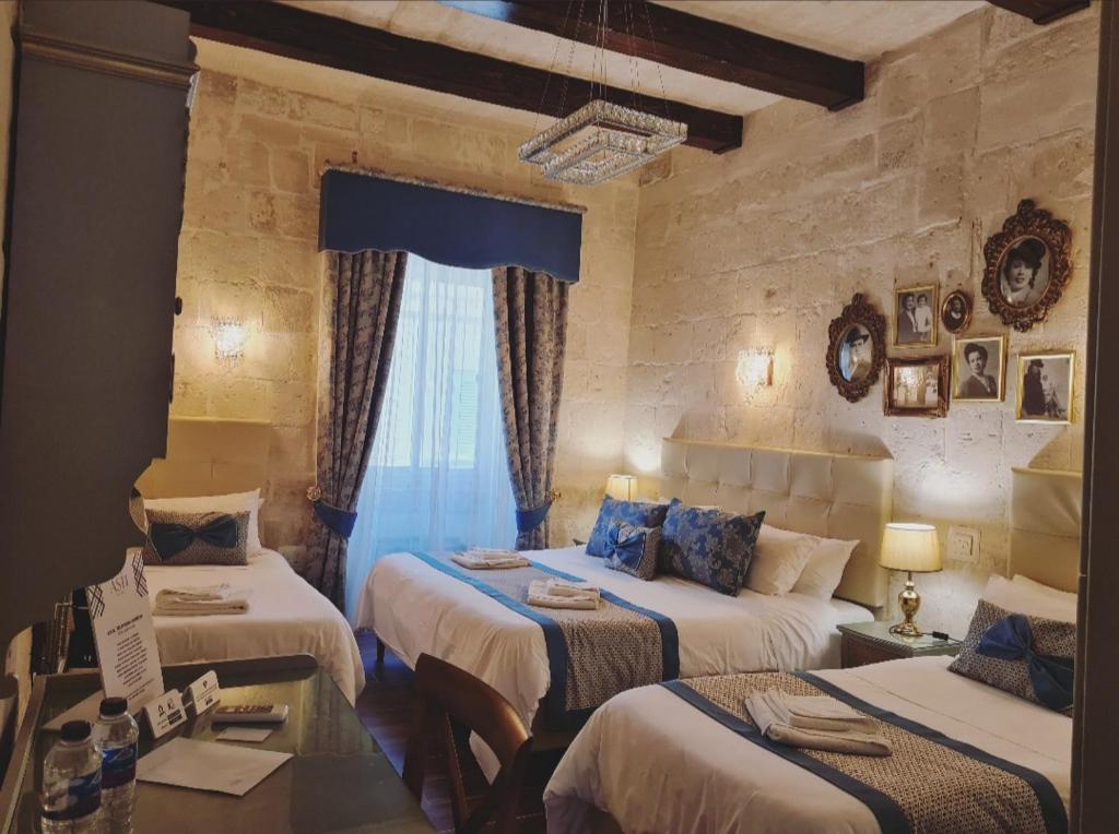 Postel nebo postele na pokoji v ubytování Casa Asti