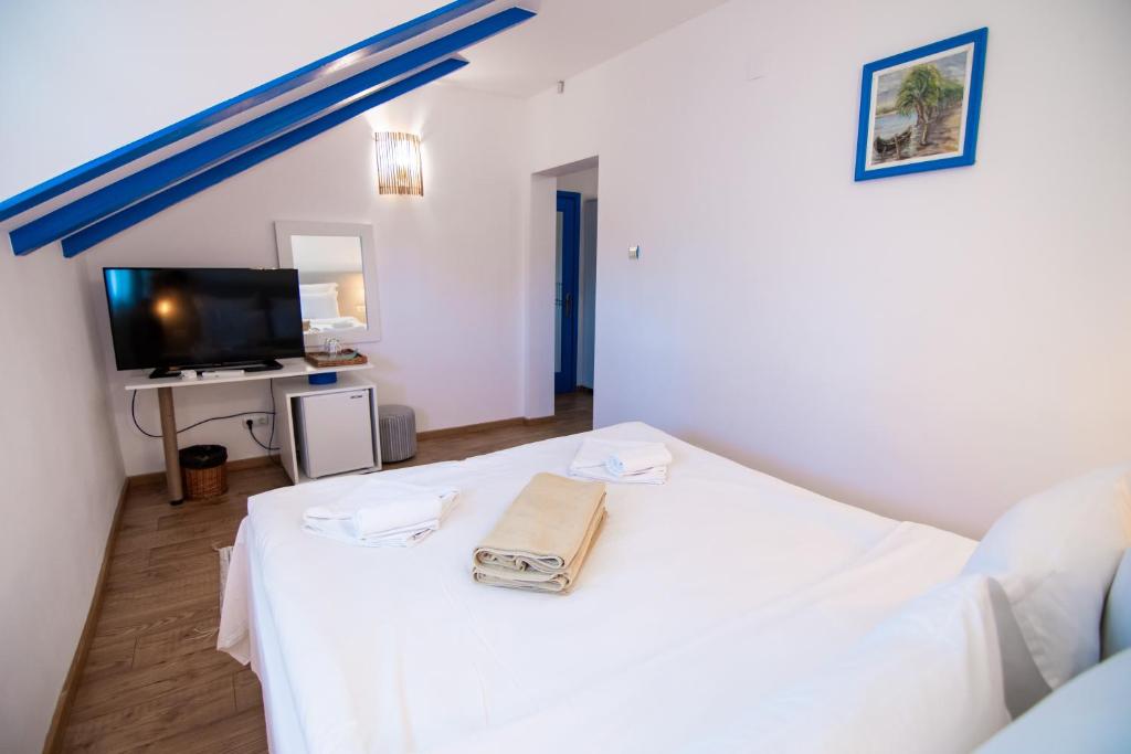 Postel nebo postele na pokoji v ubytování Cherhana Resort
