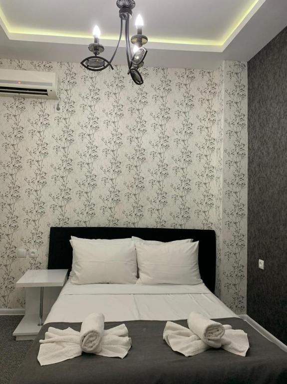 Postel nebo postele na pokoji v ubytování Hotel DavidL