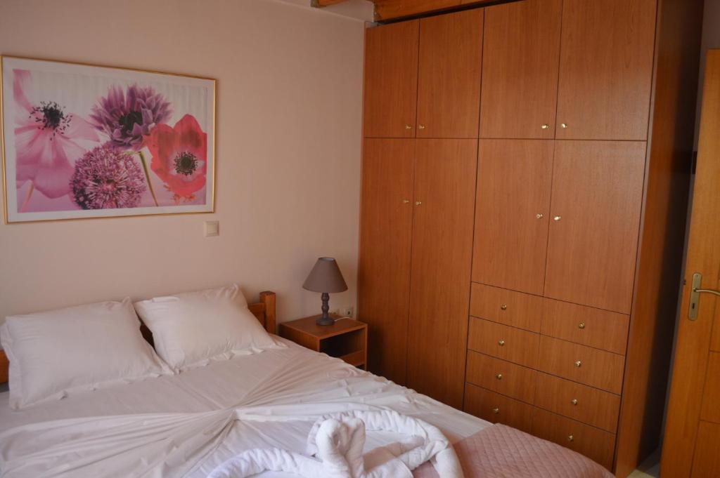 Posteľ alebo postele v izbe v ubytovaní Anastasias Apartment center City F
