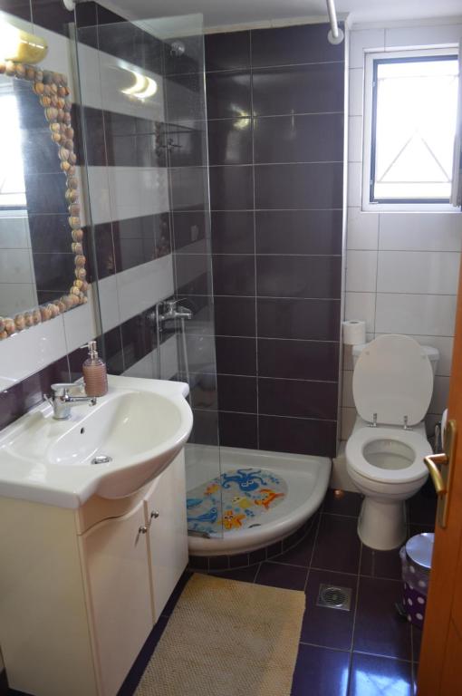 Kúpeľňa v ubytovaní Anastasias Apartment center City F