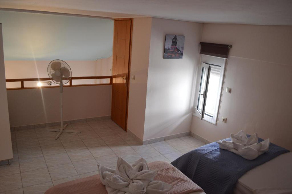 Posteľ alebo postele v izbe v ubytovaní Anastasias Apartment center City F