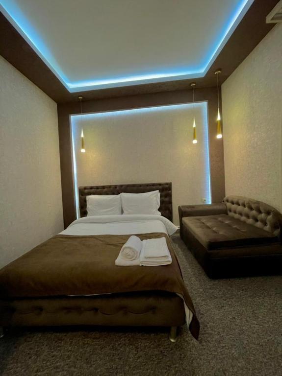Postel nebo postele na pokoji v ubytování Hotel DavidL