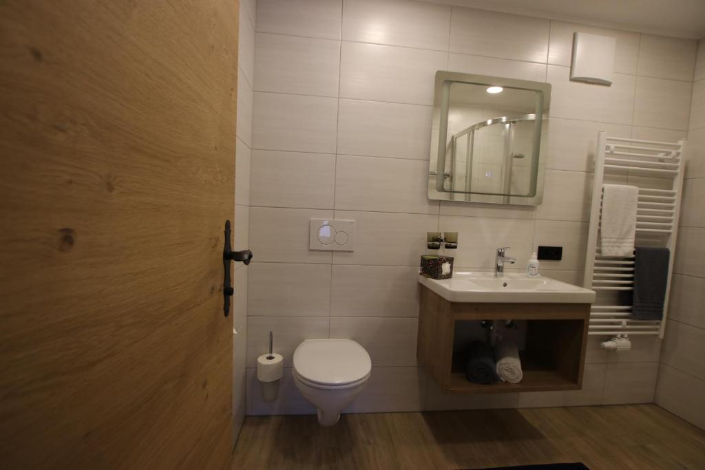 Koupelna v ubytování Haus Enzian Apartments