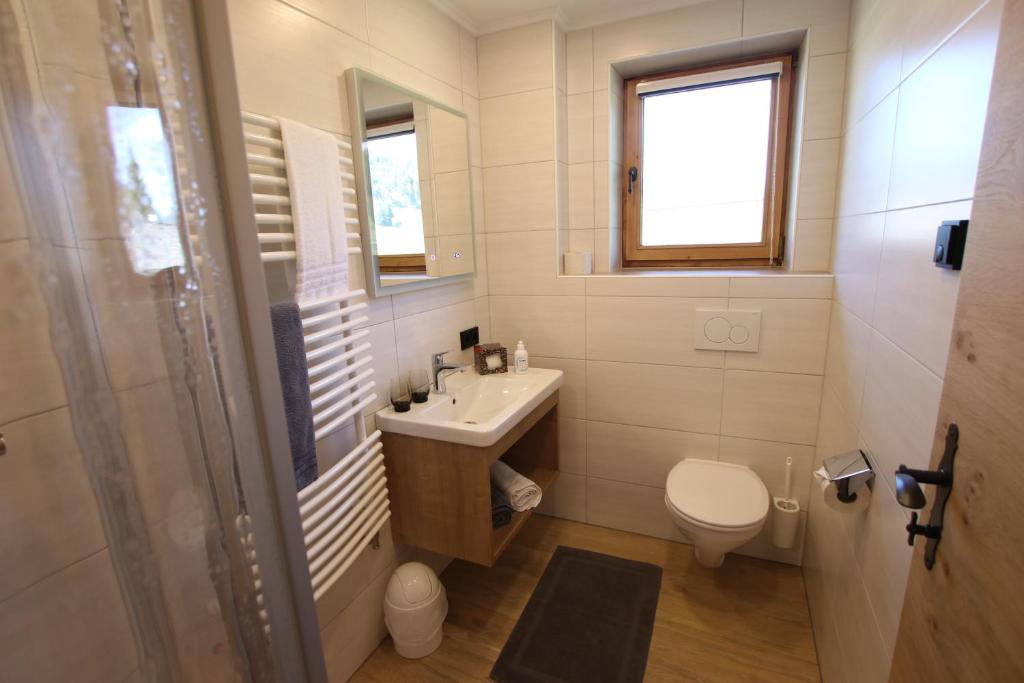 Koupelna v ubytování Haus Enzian Apartments