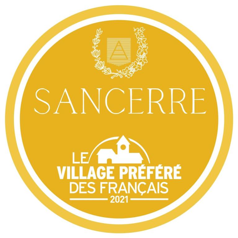 a label for a volunteer assistance program for refugees at Saint Vincent in Bué
