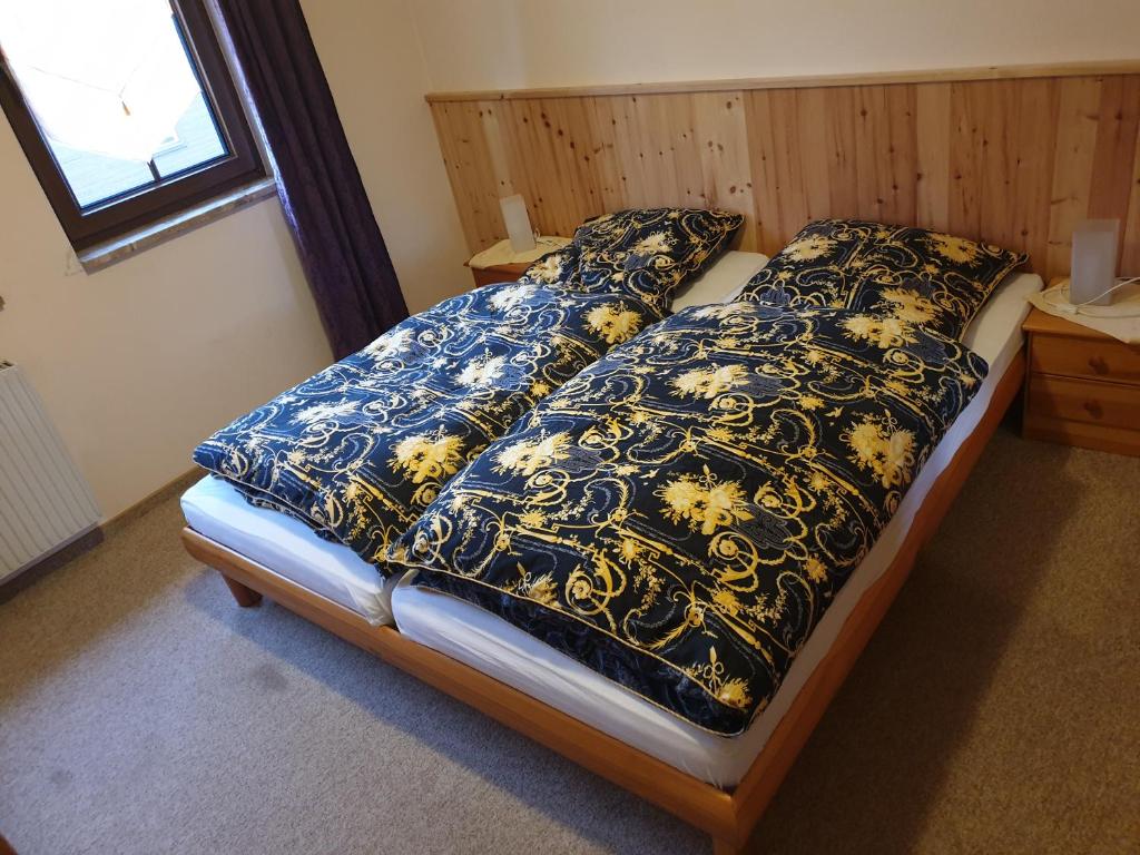 Postel nebo postele na pokoji v ubytování Apartment fewobaerenstein
