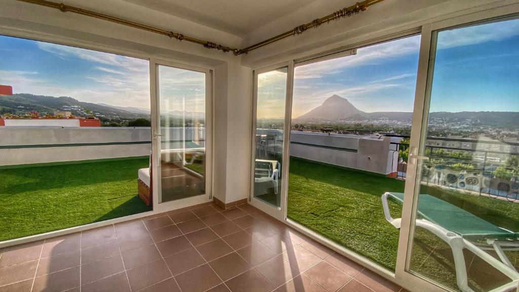 Nespecifikovaný výhled na hory nebo výhled na hory při pohledu z apartmánu