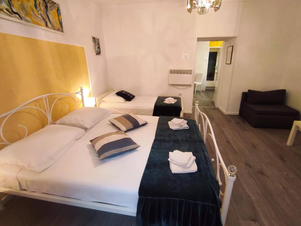 Postel nebo postele na pokoji v ubytování Apartman Plasse