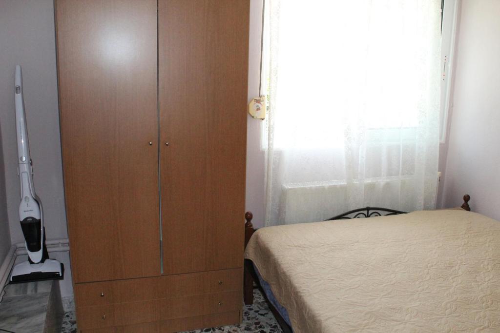 Posteľ alebo postele v izbe v ubytovaní HOLIDAY KAVALA