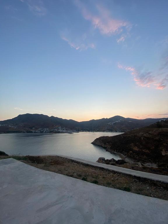 a view of a body of water at sunset at Astra Serifos in Livadi