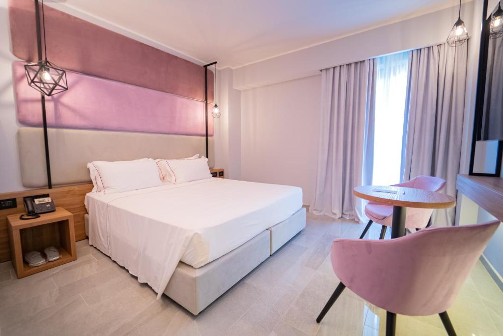 Postel nebo postele na pokoji v ubytování Best Western Plus Sabaudia Hotel