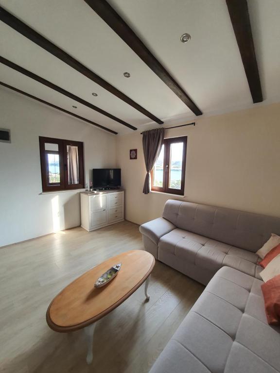 Posezení v ubytování Holiday House Pag
