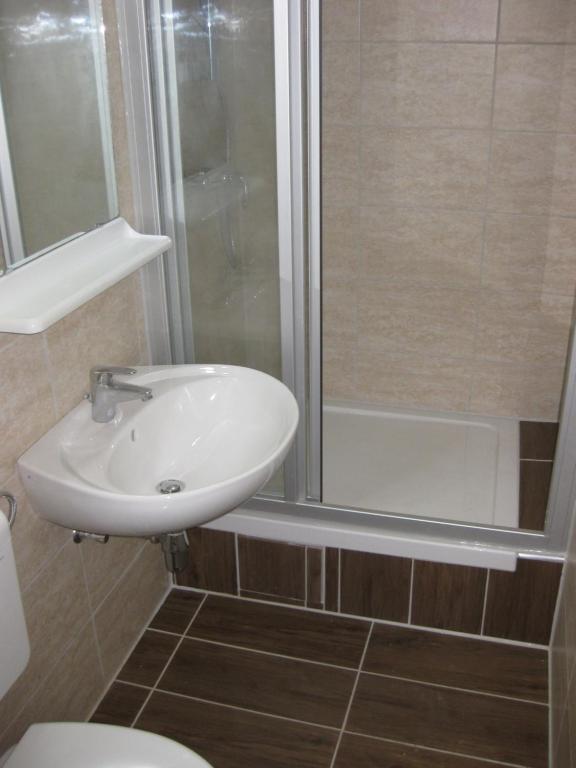 Kúpeľňa v ubytovaní Parti Apartman