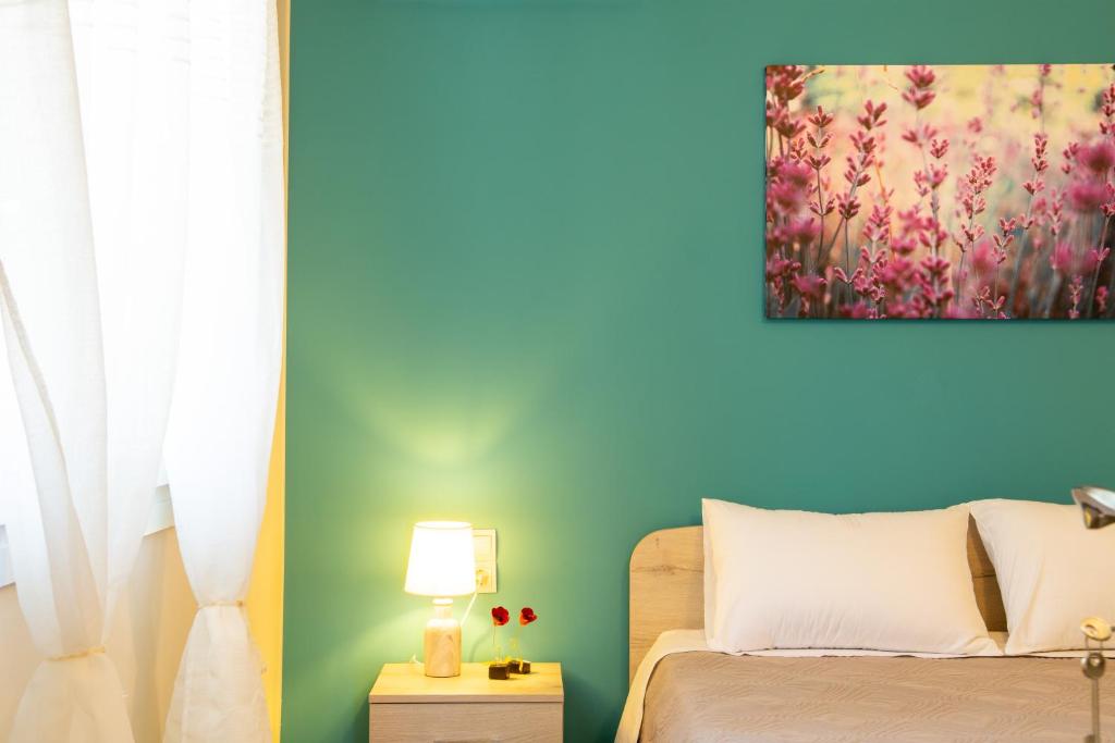 Posteľ alebo postele v izbe v ubytovaní Eleni's Cozy House