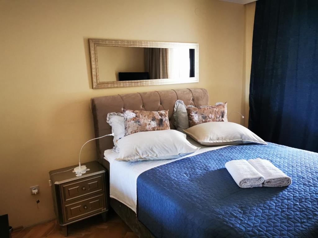 Posteľ alebo postele v izbe v ubytovaní Villa Bose- Apartmani Luka Šodan