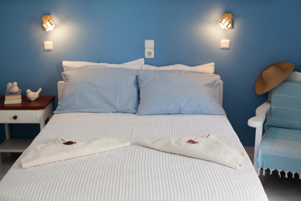 Postel nebo postele na pokoji v ubytování Guesthouse Perdikouli