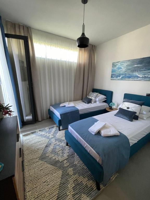 Un ou plusieurs lits dans un hébergement de l'établissement Allure Luxury Villas 3&4 Serenity Retreat