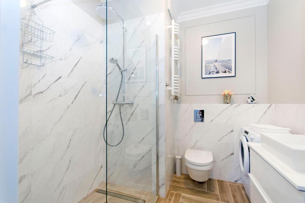 Kúpeľňa v ubytovaní Apartamenty na Uphagena