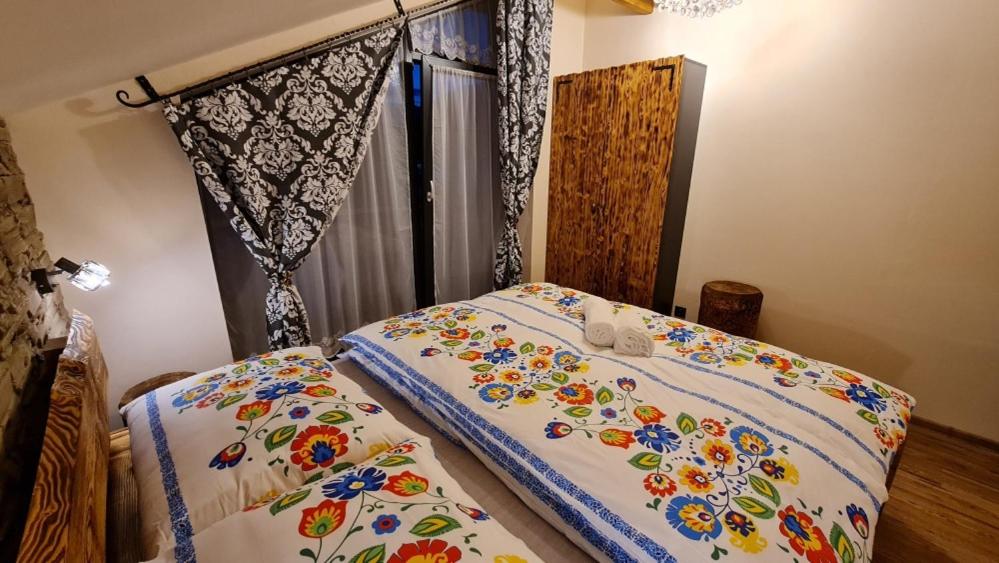 Postel nebo postele na pokoji v ubytování Chata Ďumbier