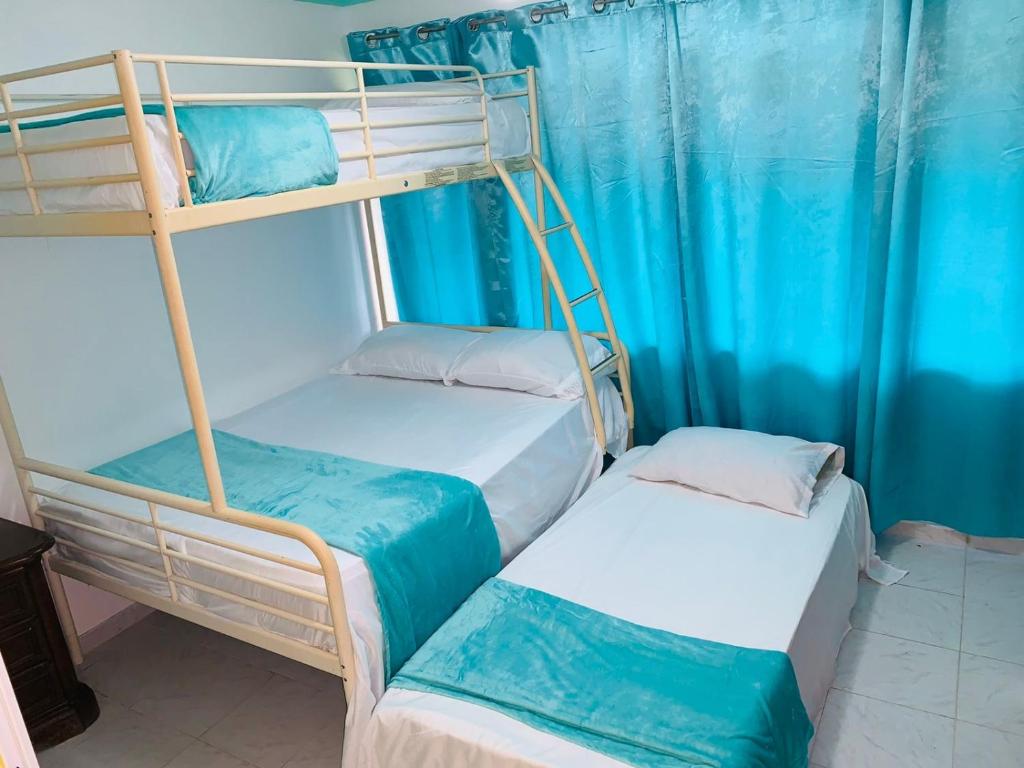 Postel nebo postele na pokoji v ubytování La Gaviota B1
