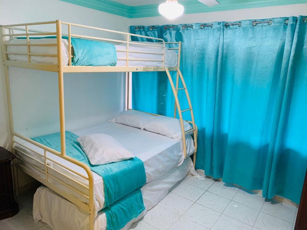 Postel nebo postele na pokoji v ubytování La Gaviota B1