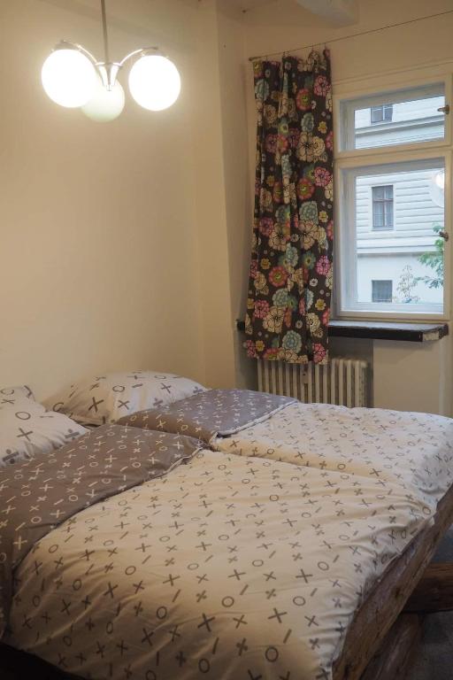 Postel nebo postele na pokoji v ubytování Rodinný apartmán v centru Prahy