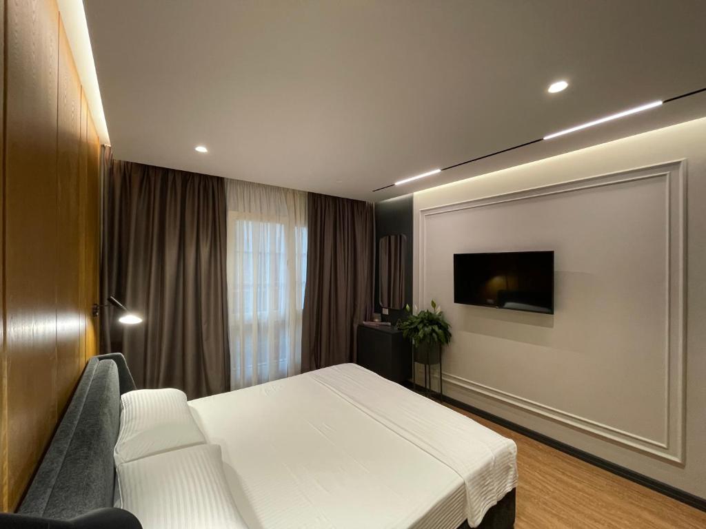 TV a/nebo společenská místnost v ubytování Hotel La Favorita