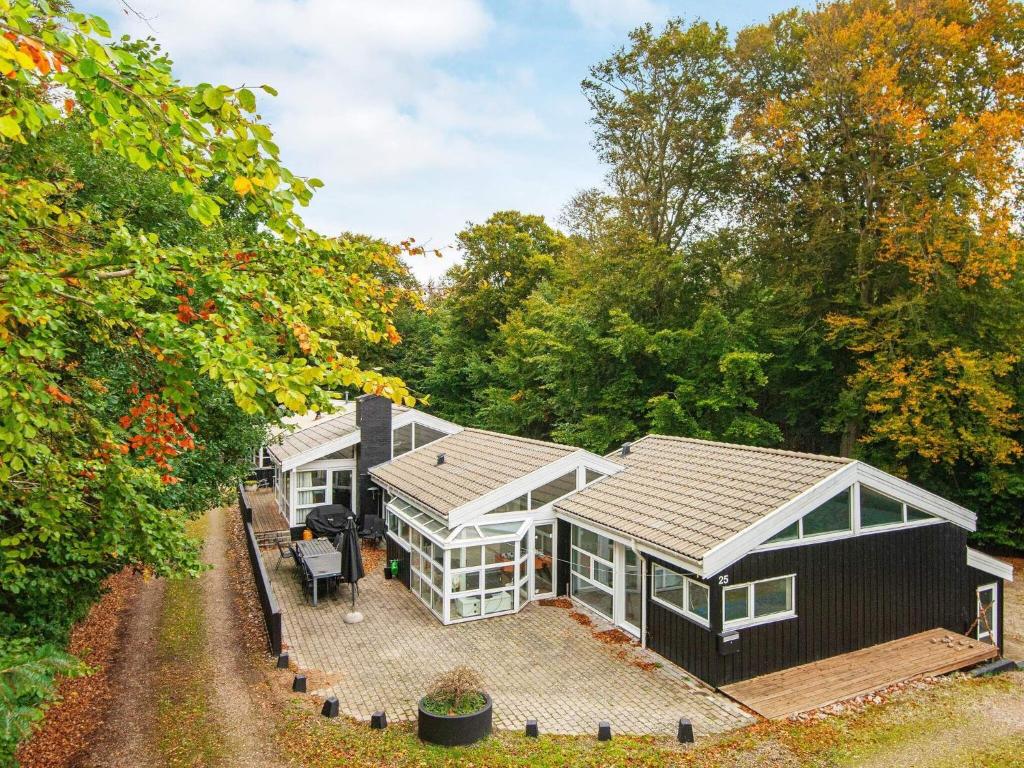 an overhead view of a house with a roof at 14 person holiday home in Glesborg in Glesborg