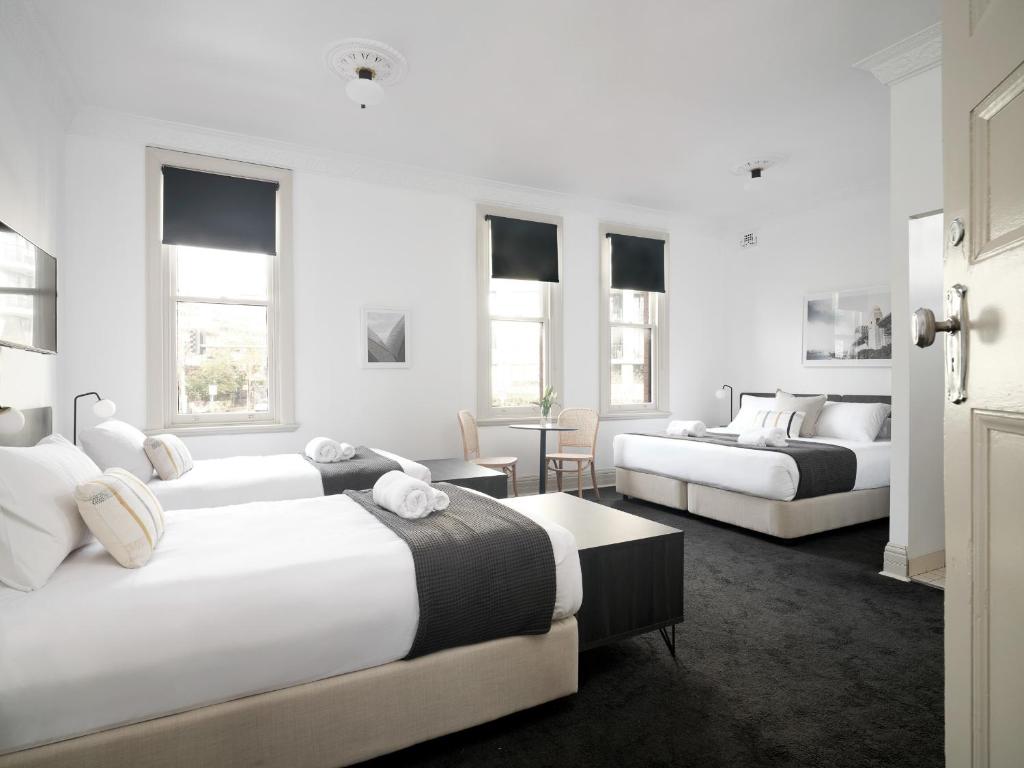 Postel nebo postele na pokoji v ubytování Dunkirk Hotel Pyrmont