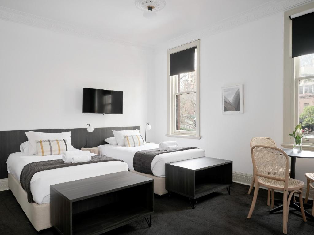 Postel nebo postele na pokoji v ubytování Dunkirk Hotel Pyrmont