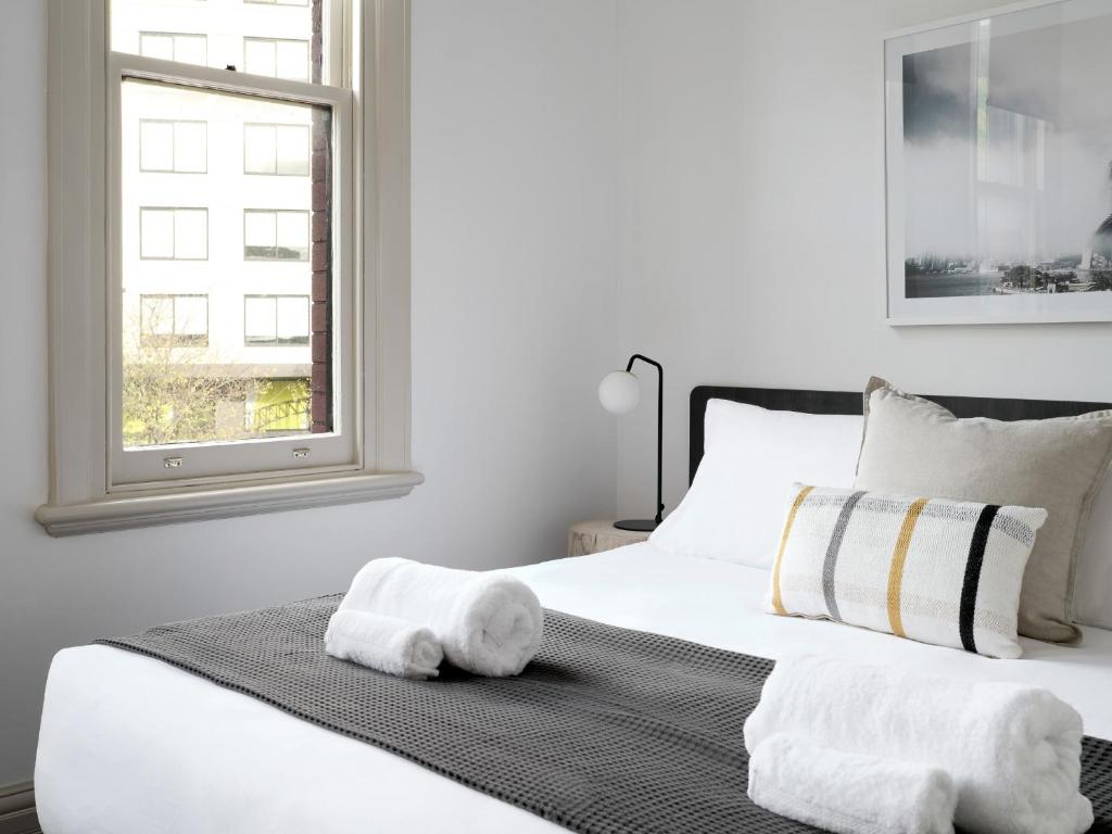 Postel nebo postele na pokoji v ubytování Dunkirk Hotel Pyrmont